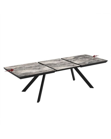 Tavolo allungabile Corin con piano effetto marmo nero arabesque lucido e gambe in metallo nero