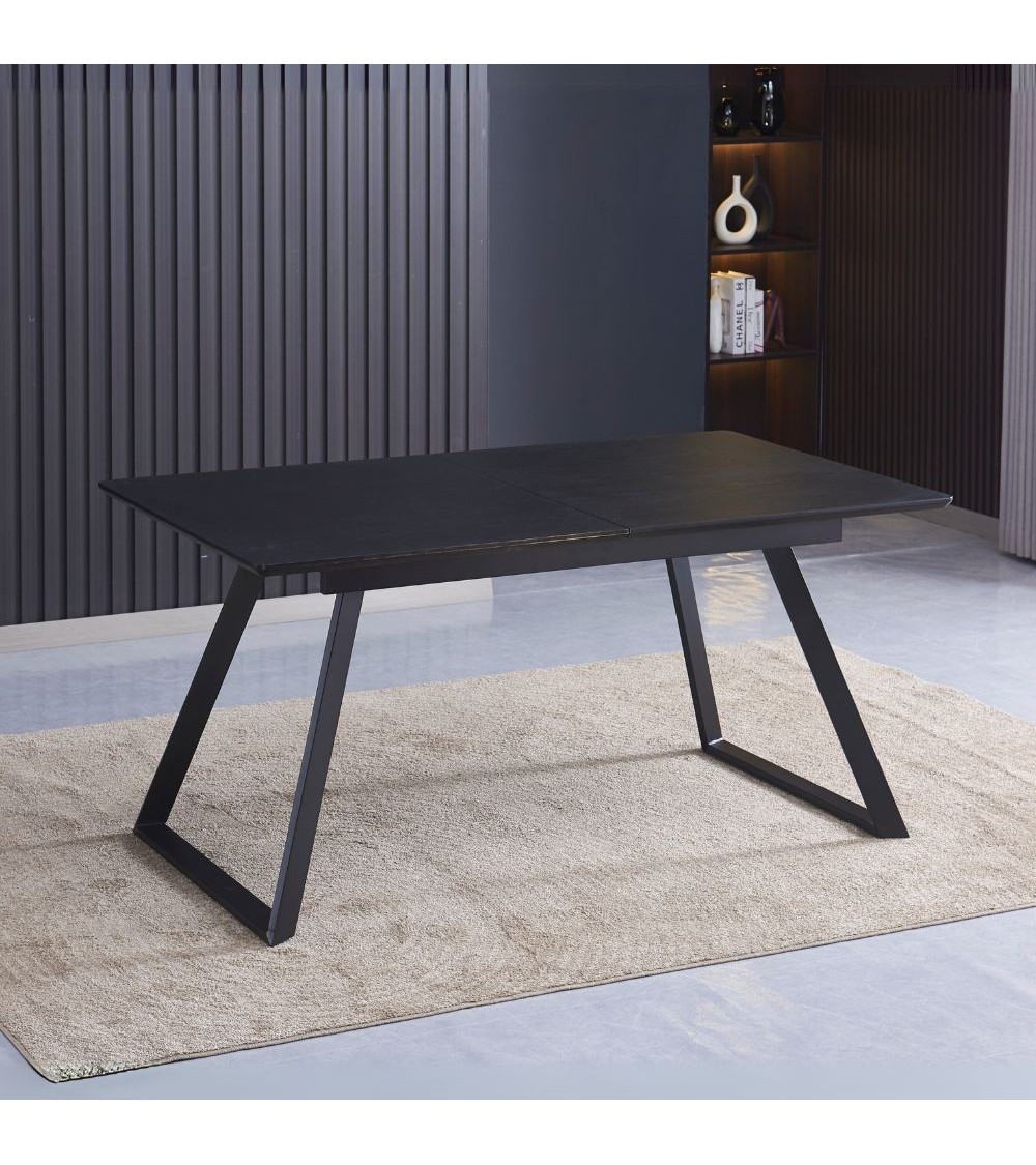 Tavolo allungabile Shelton con piano impiallacciato legno massiccio tinto nero e gambe in metallo nero