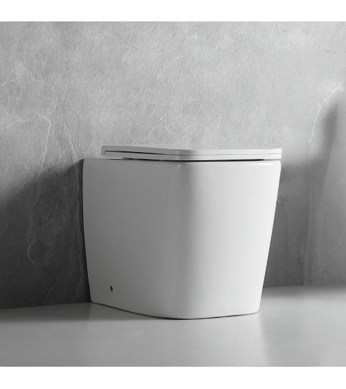 WC filo muro FT54D a pavimento in ceramica bianco 54x36x42H cm.