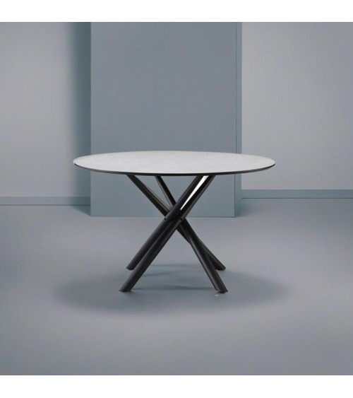 Tavolo tondo Logan con piano cemento e gambe in metallo nero Φ120*76.5 cm.
