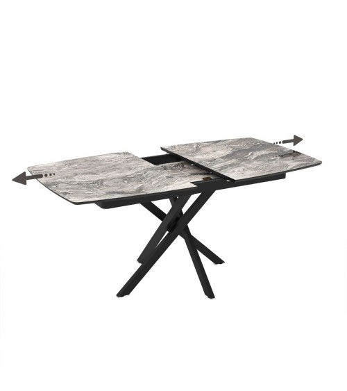 Tavolo allungabile Filis con piano effetto marmo arabesque nero lucido e gambe in metallo nero